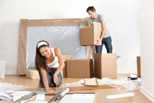 Moving van and boxes prepared for a home move in Bayswater