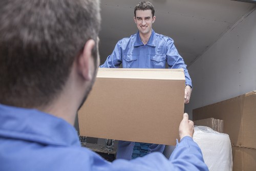 Local removal team helping with a Bayswater home move near apartment buildings