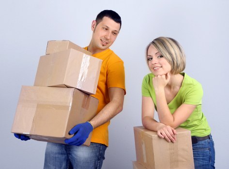 Packed boxes and furniture prepared for a Bayswater house removal service