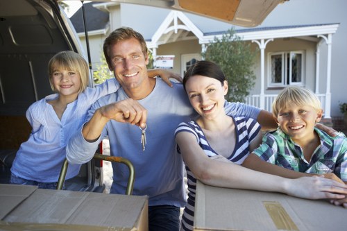 Professional movers handling apartment removals in Bayswater with narrow stair access