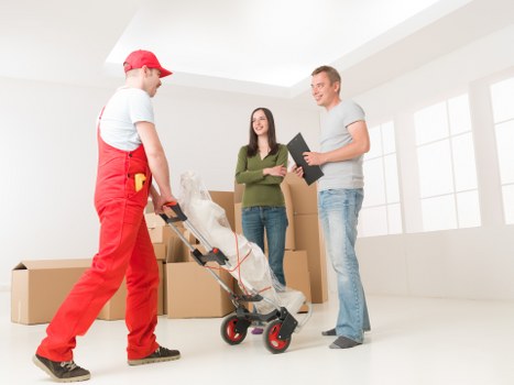 Trained moving staff using protective equipment