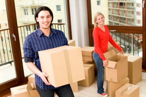 Packed office equipment and boxes ready for relocation in Bayswater